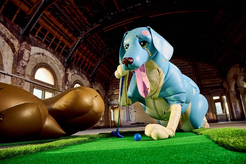 inflatable dog over mini golf course in Flinders St Station as part of RISING festival
